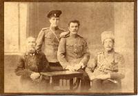 Михаил Гурьев (второй слева) с отцом и братьями. Свеаборг, 1912 год